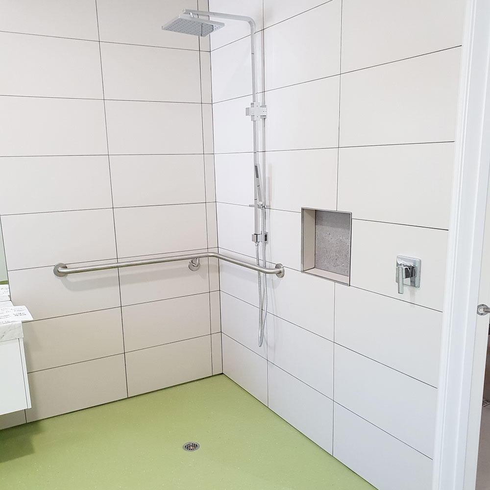 AD BUILD designs and builds disabled bathrooms.